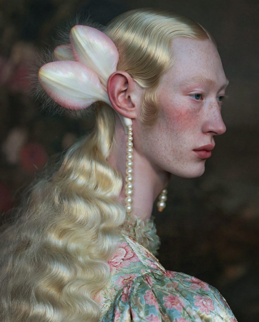 Soft ethereal portrait of a blond figure with eyes closed, white peonies in the hair and lace — The OysterVerse by Franka Louisa